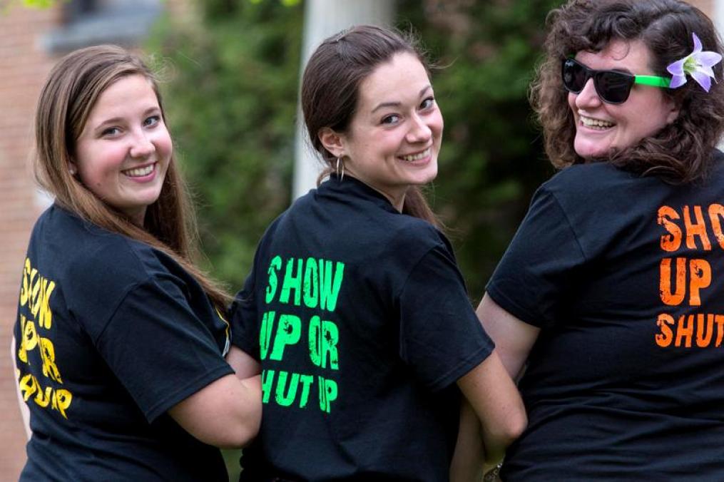 Students showing off their CAB shirts