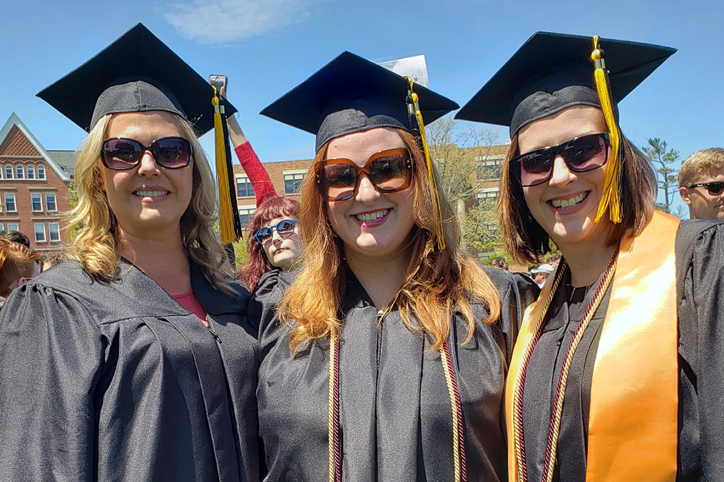 Alyssa Frederick with her business management degree cohort.