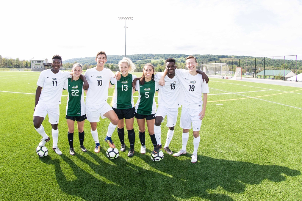 Keuka Soccer players posing on the field