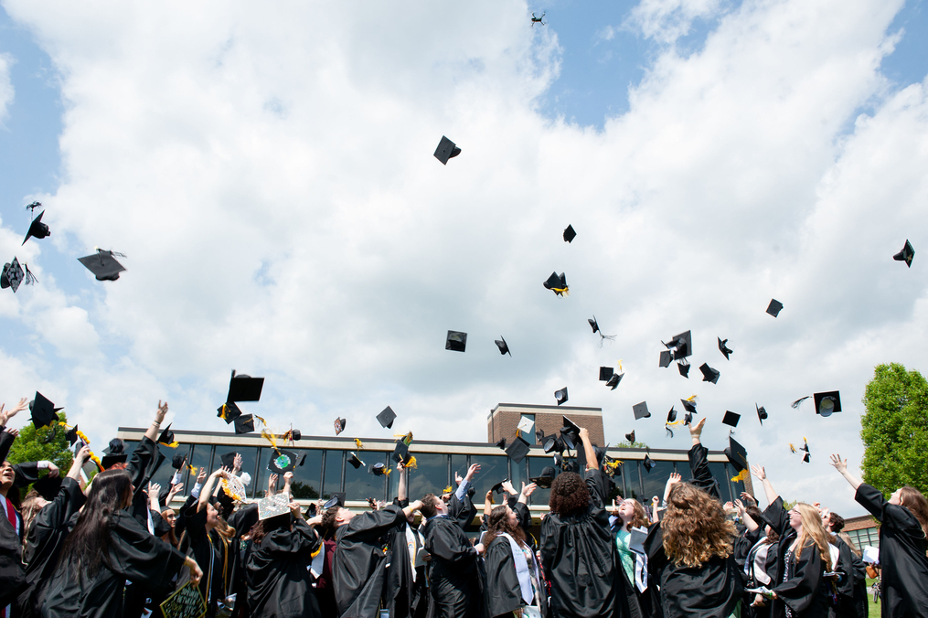 KC Graduates tossing their caps at the 2022 Commencement Ceremony 