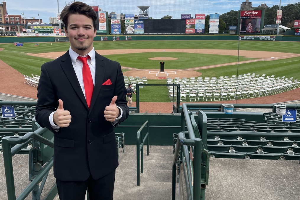 David Luke in the stands on a baseball field